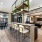 Spacious and well lit resident lounge with wood floors and bar seating