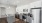 Kitchen with white cabinets and stainless steel